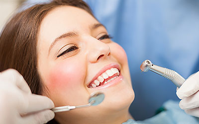 Woman Smiling at the Clinic