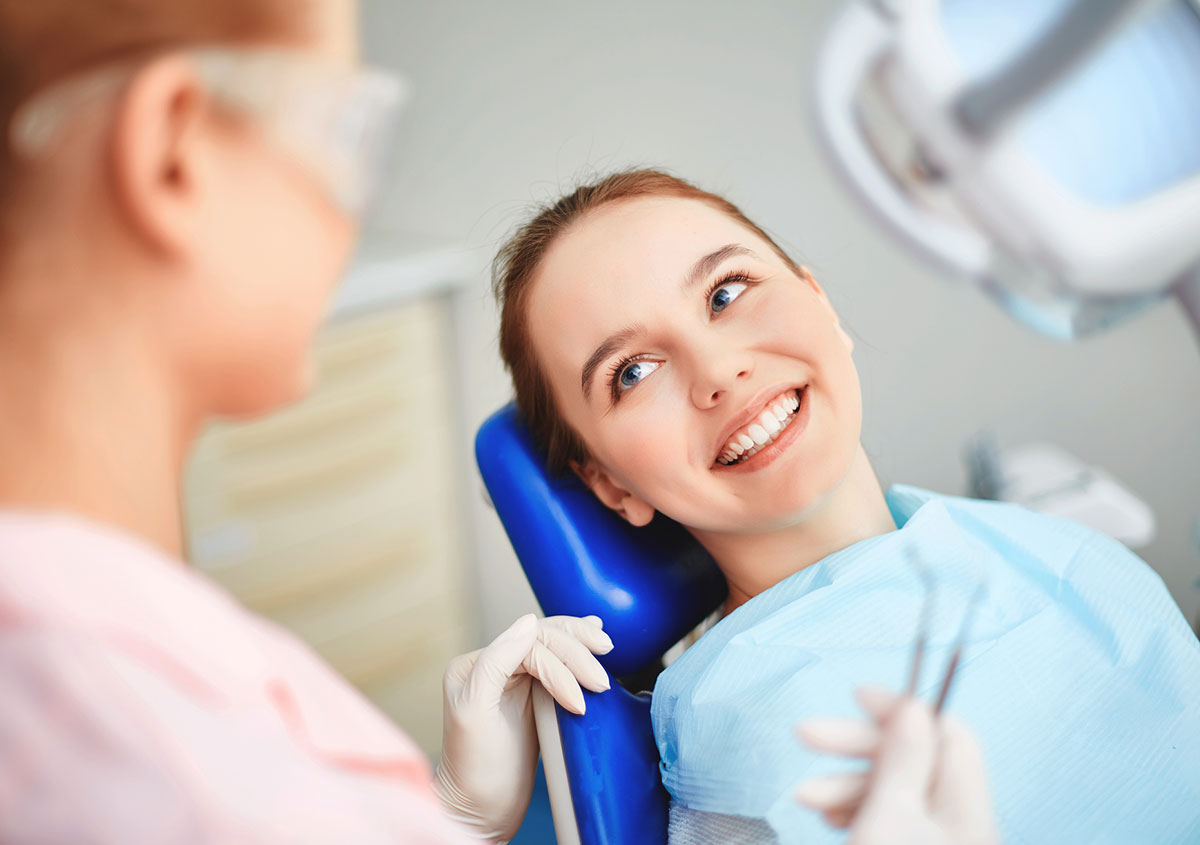 Woman smiling at the dental