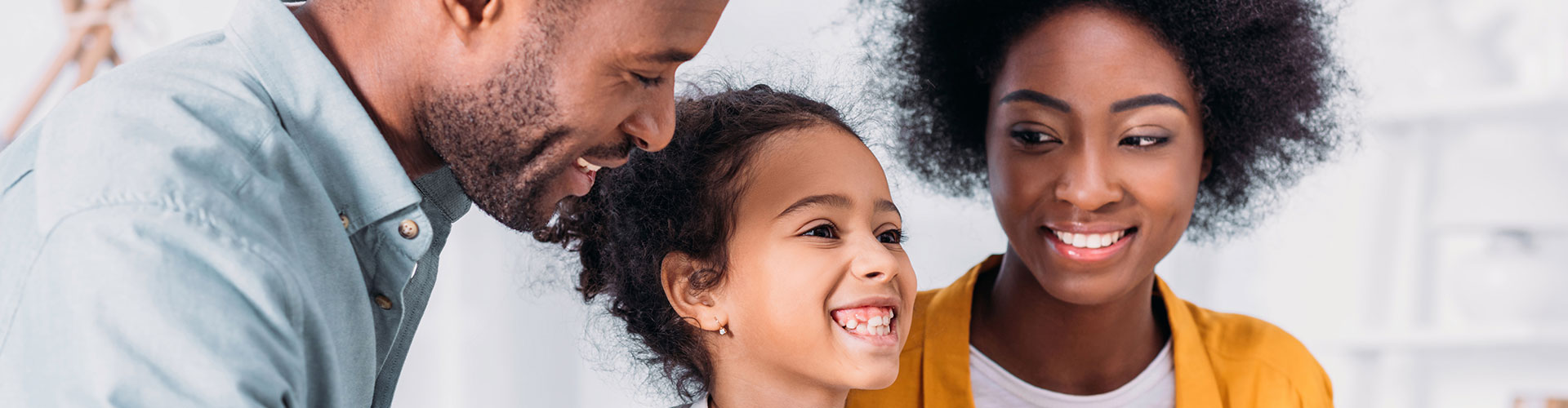 Beautiful family smiling together - Dentist in West Chester PA