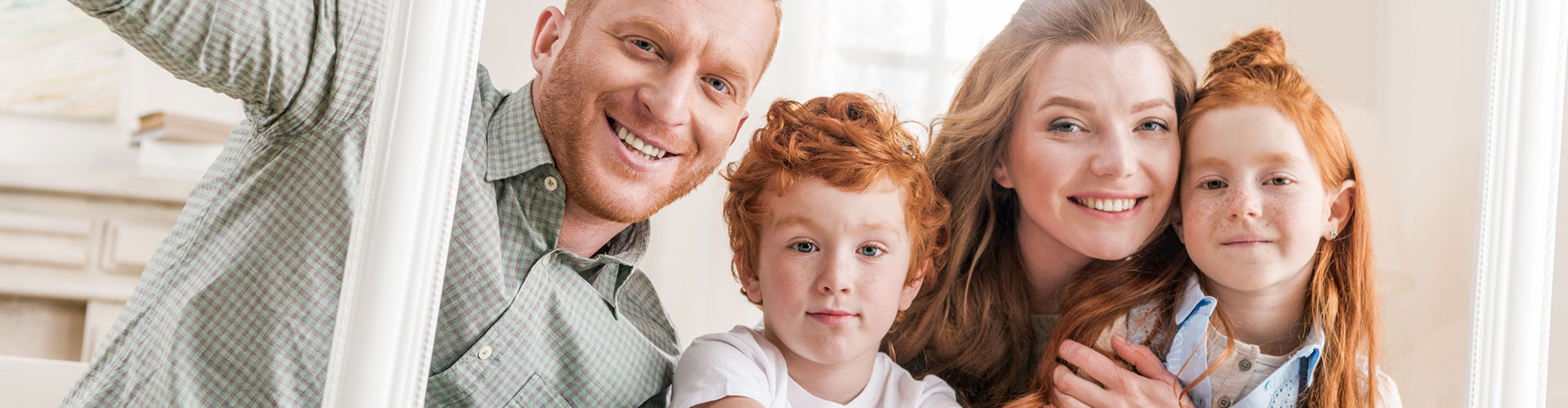 Beautiful family smiling together - Dentist in West Chester PA