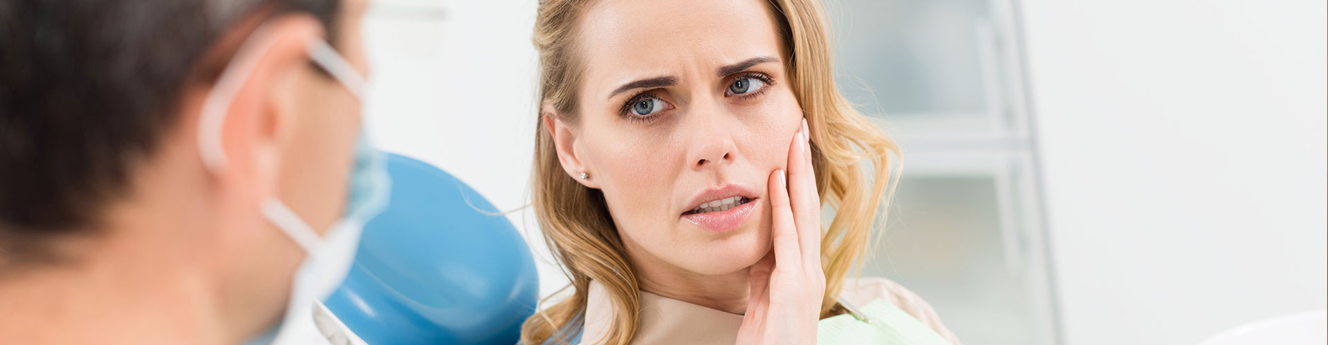 Woman having toothache - Dentist in West Chester PA