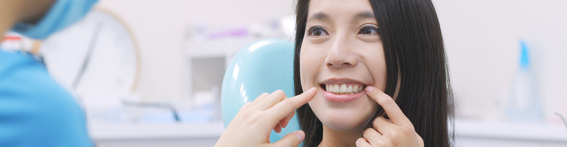 Woman smiling at the clinic - Dentist in West Chester PA