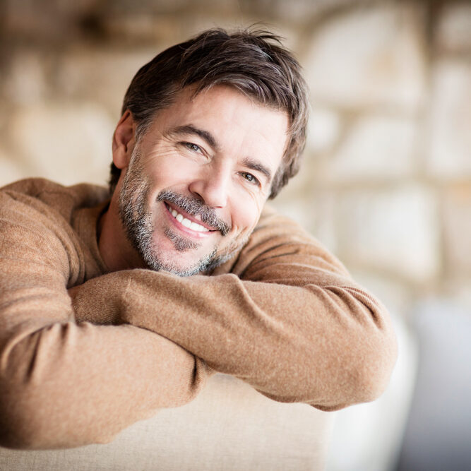 Happy smile after a stress free Dental Implants in West Chester PA
