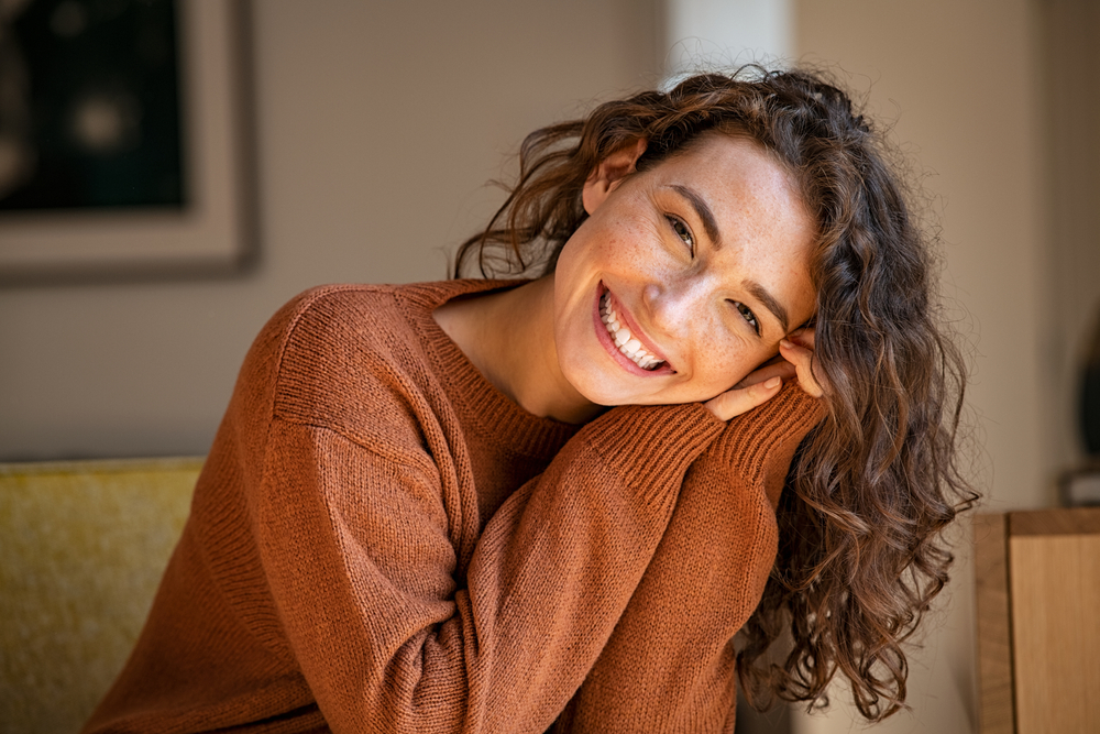 Happy smile from a girl satisfied with her Porcelain Veneers in West Chester PA