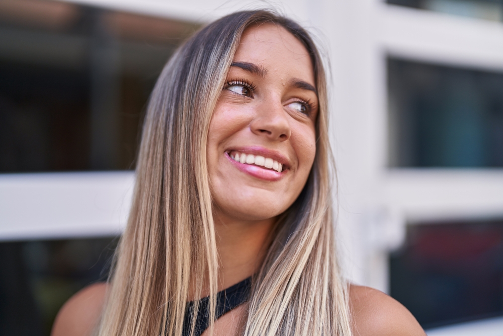 Confident smile with her Fixed Dental Bridges in West Chester PA