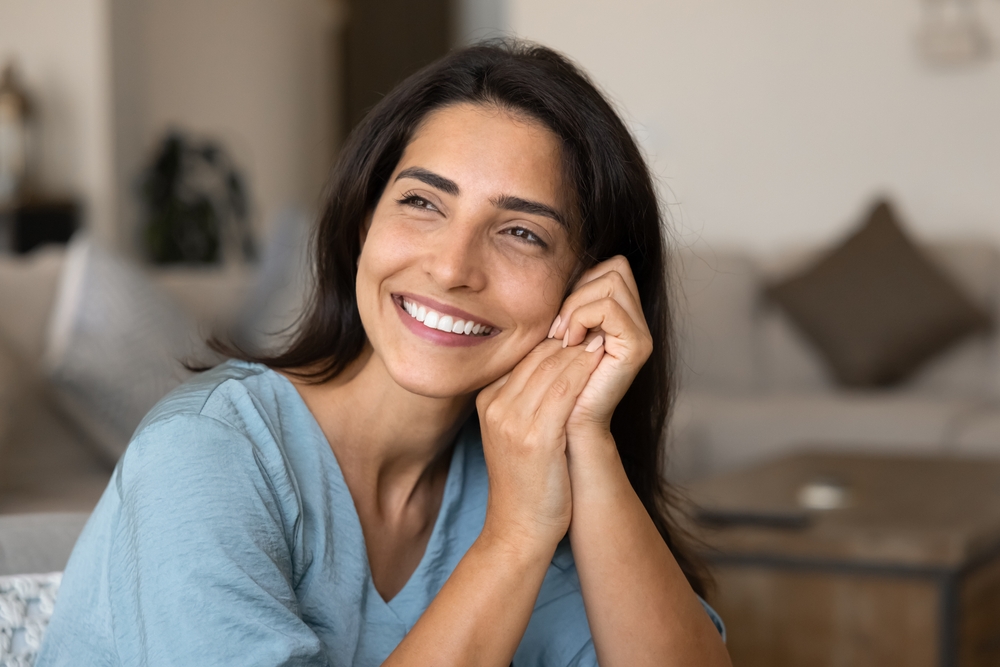Woman satisfied with her Porcelain Dental Crowns in West Chester PA